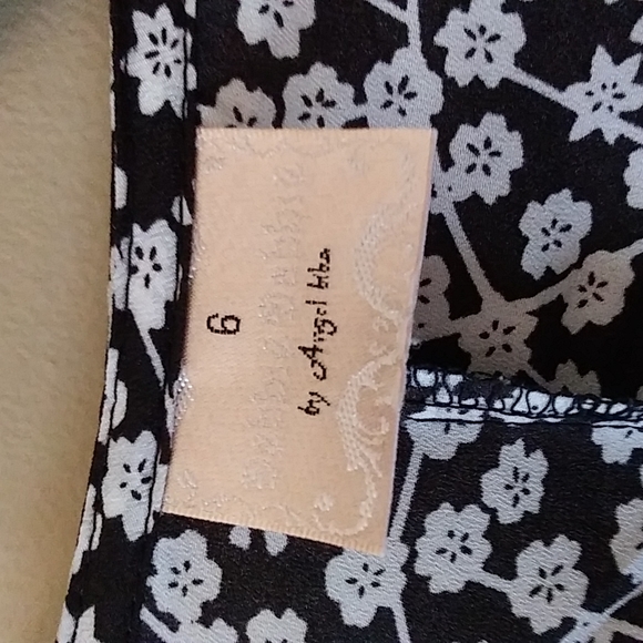 Short sleeved wrap around dress ties in the back. - Picture 4 of 5